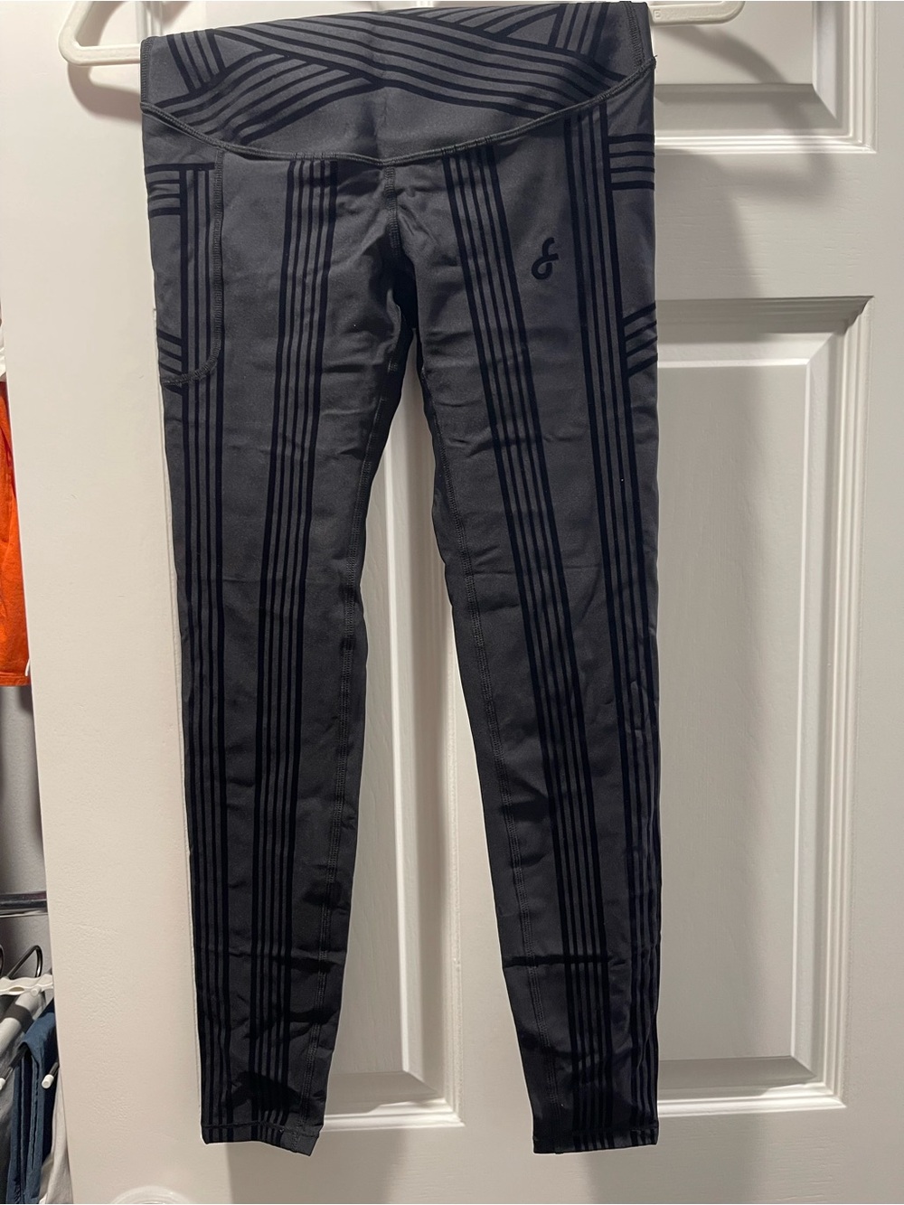 High-Rise Black Striped Leggings with Tonal Geometric Detail
